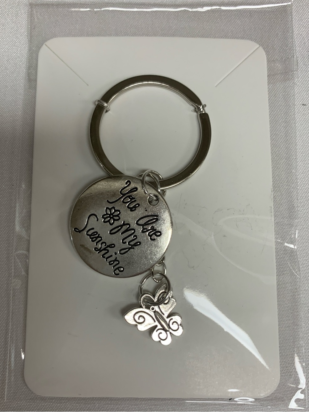 Silver 'You Are My Sunshine' Round Keychain with Butterfly Charm